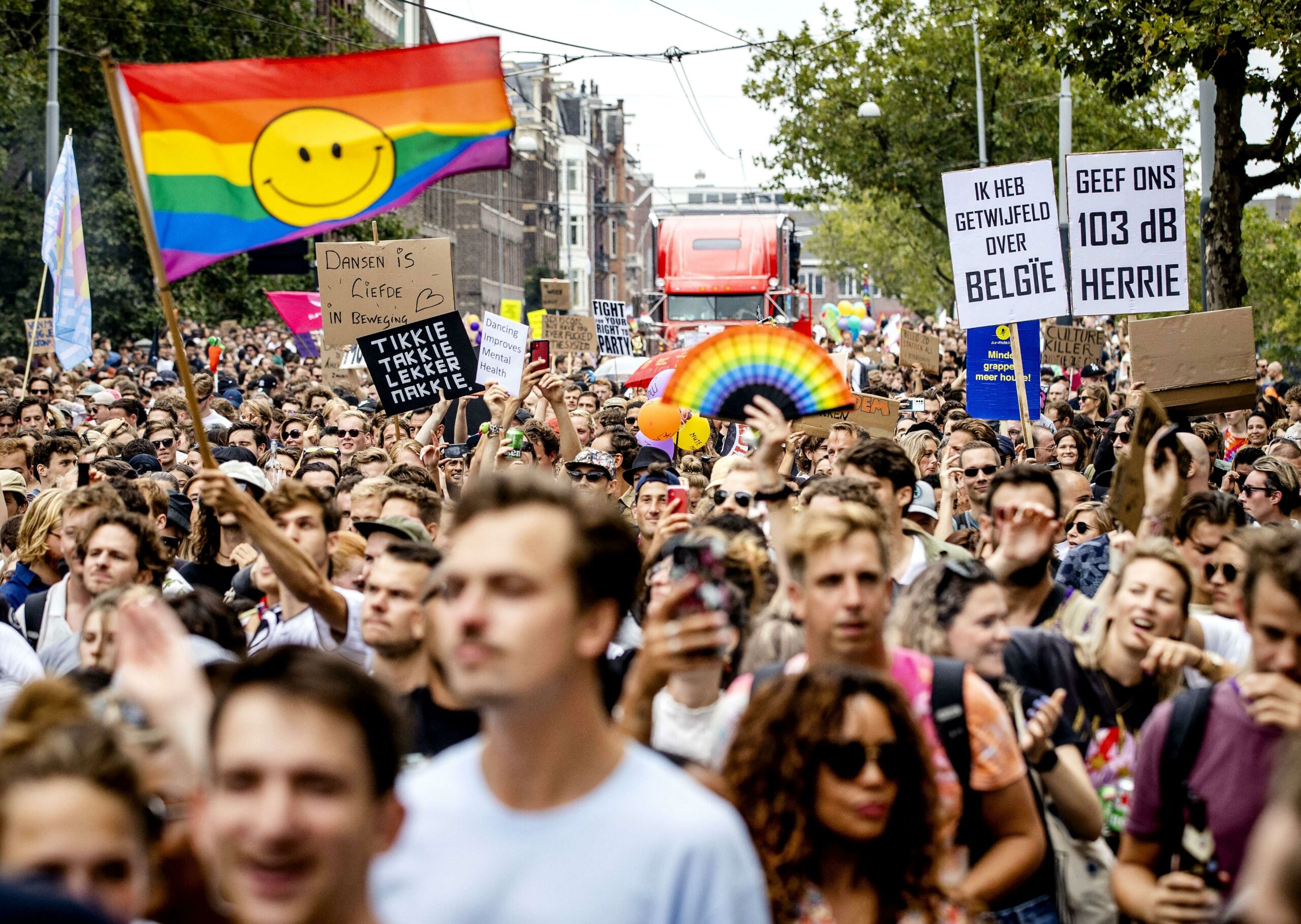 People participate in the Unmute Us! march to protest against Covid-19 policy across the Netherlands In Amsterdam, Sept. 11, 2021.