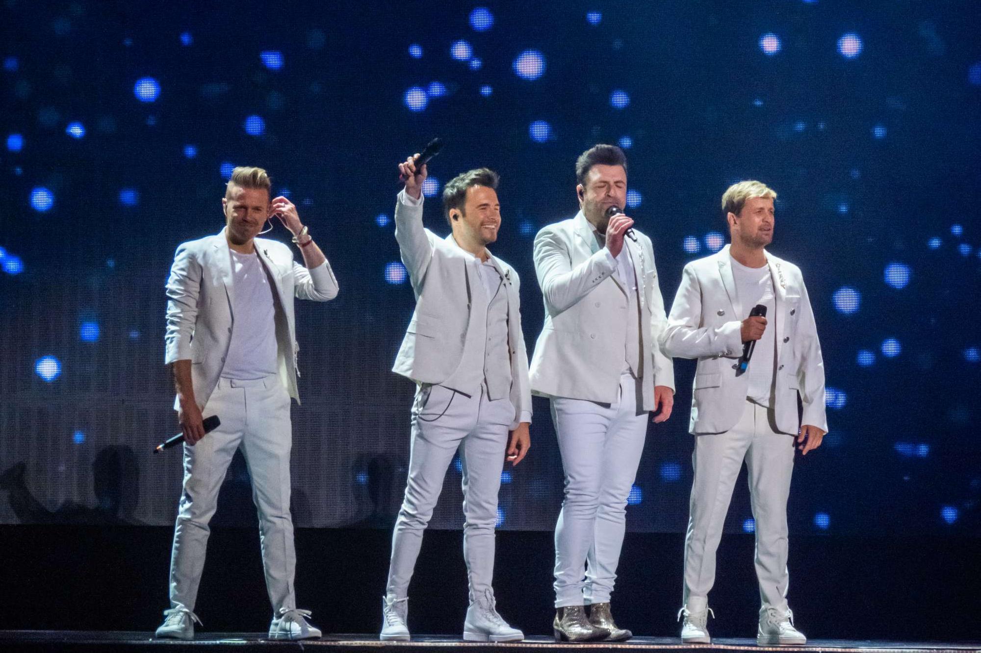 Shane Filan, Mark Feehily, Kian Egan and Nicky Byrne of Westlife during 'The Twenty Tour' at Cadillac Arena Beijing, China, Aug. 13, 2019.