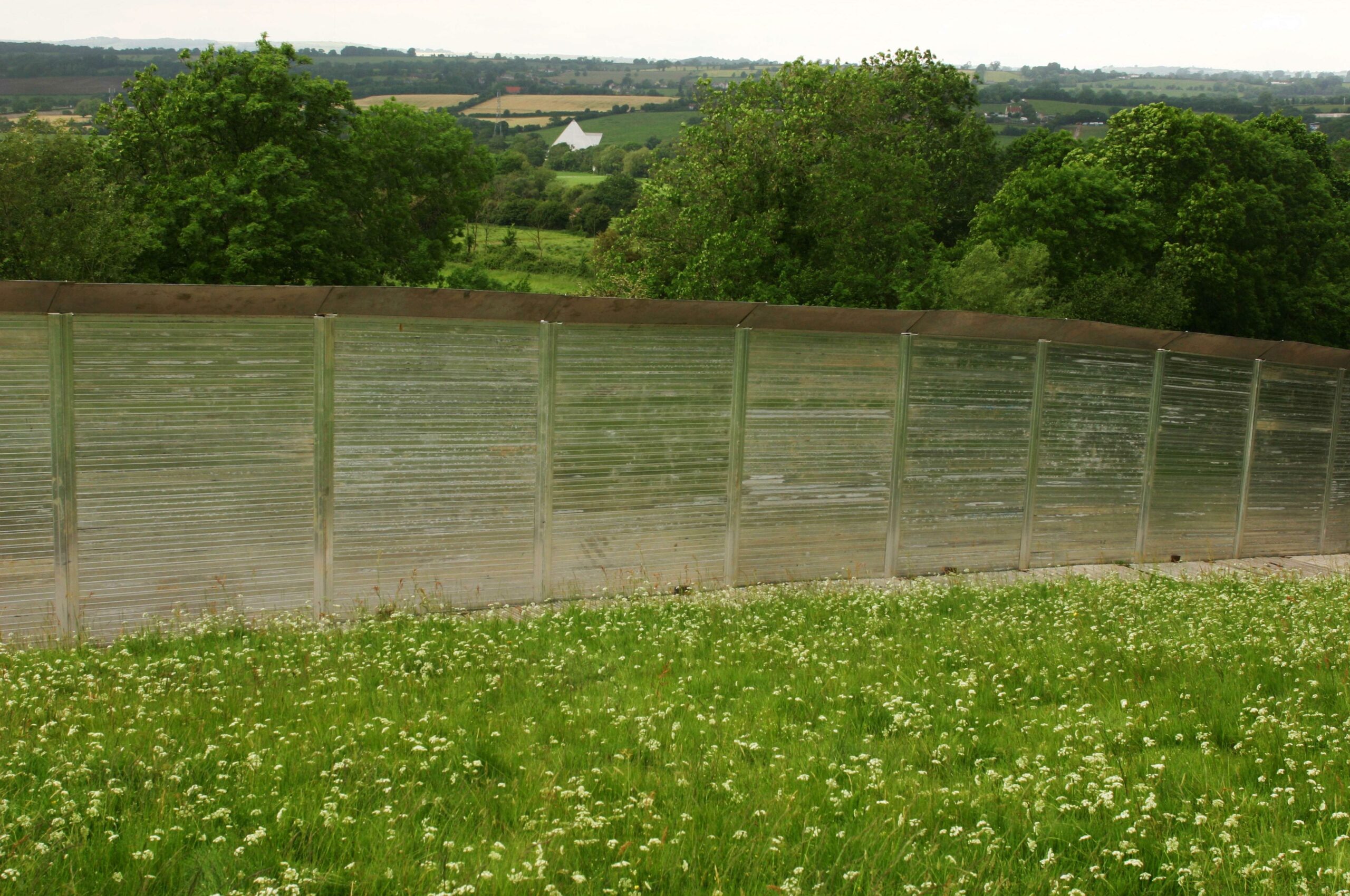 A view of the Pyramid stage behind the super fence