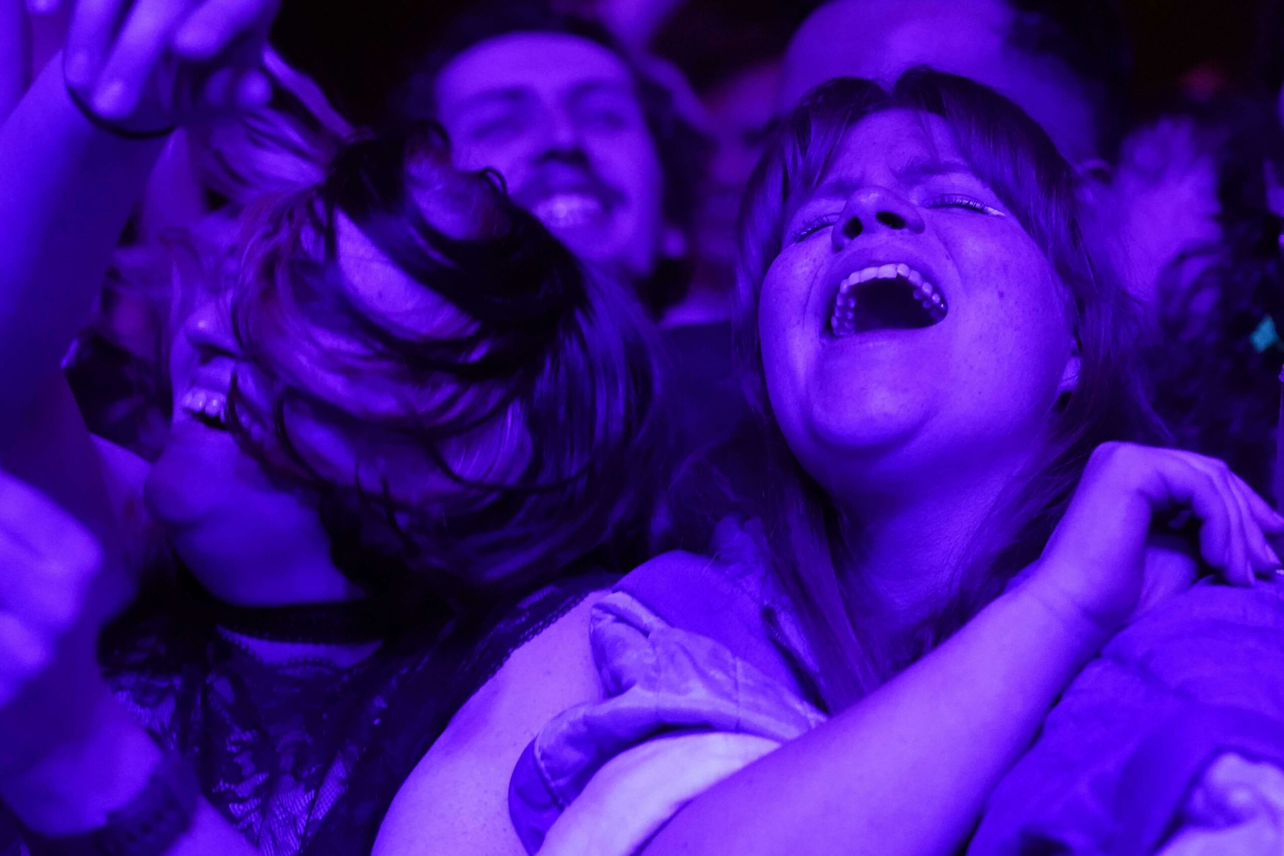 Concert-goers enjoy a non-socially distanced outdoor live music event at Sefton Park on May 2, 2021 in Liverpool, England. 