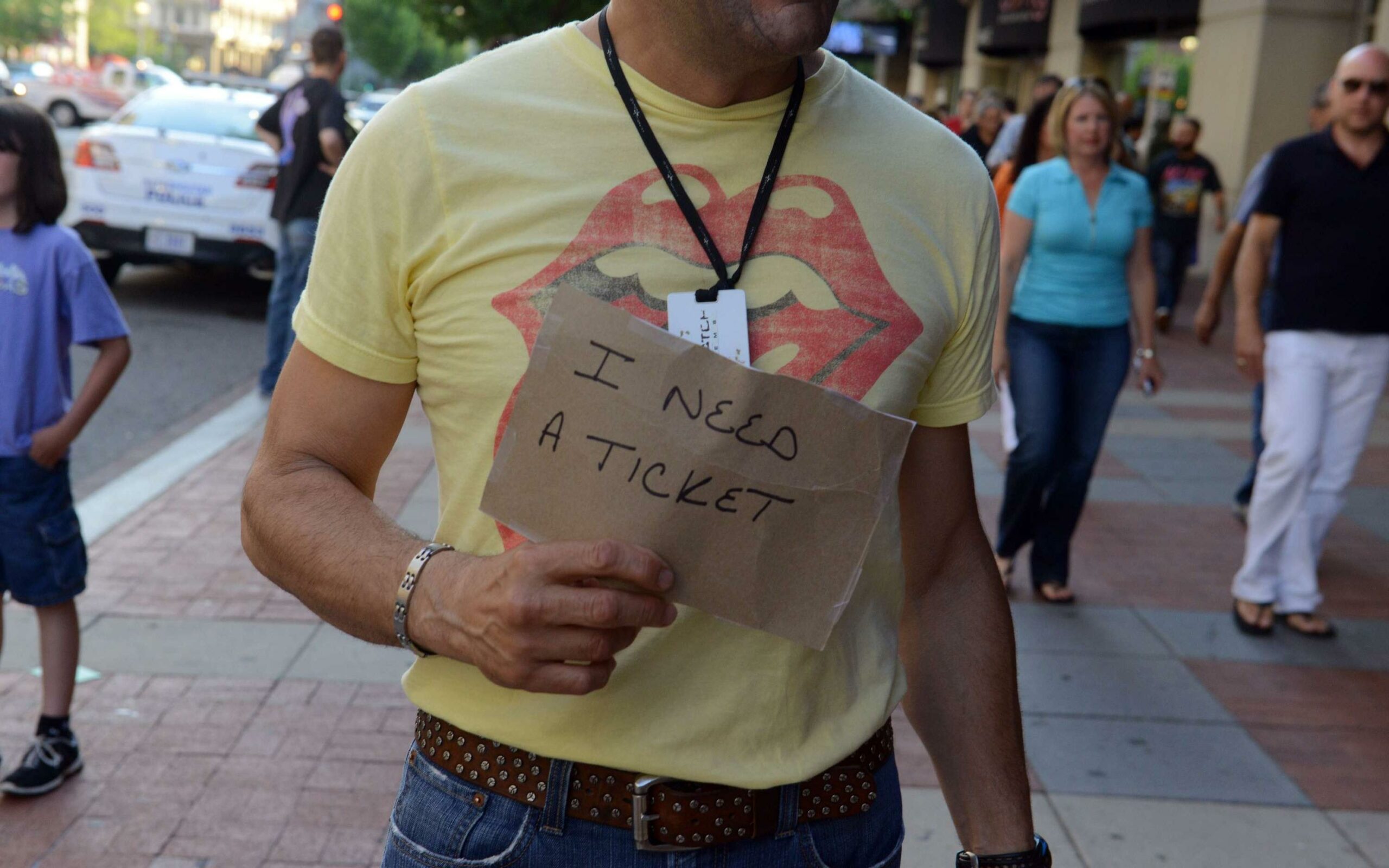 Billy Marra, 54, of Alexandria, VA, looks for a Rolling Stones concert ticket as concert-goers make their way into the Verizon Center to see the Rolling Stones in concert on Monday, June 24, 2013, in Washington, DC