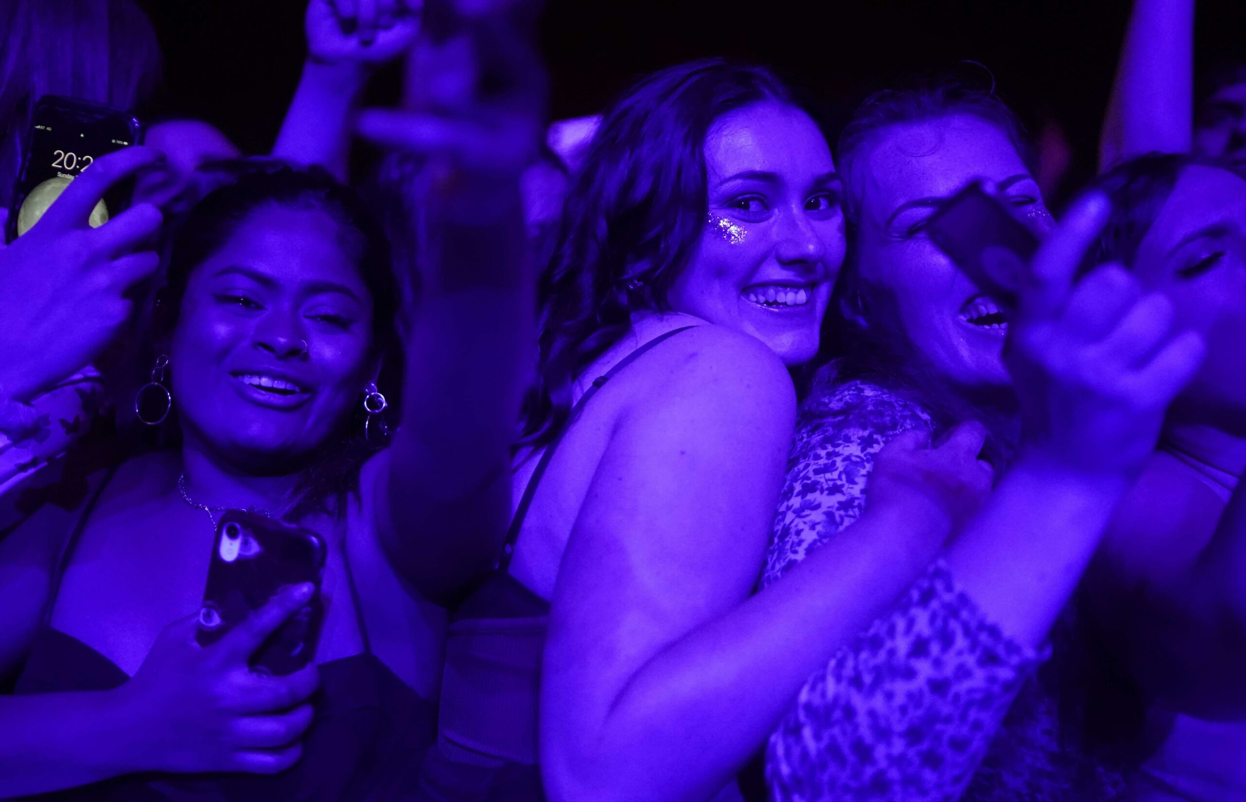 Concert-goers enjoy a non-socially distanced outdoor live music event at Sefton Park in Liverpool, England, May 2, 2021. 