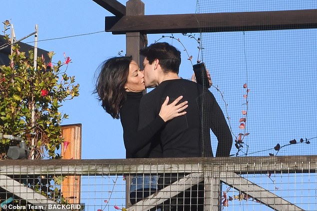 sealed with a kiss: Melanie Sykes was spotted enjoying a passionate smooch with her toyboy gondolier lover Riccardo Simionato in Venice on Saturday