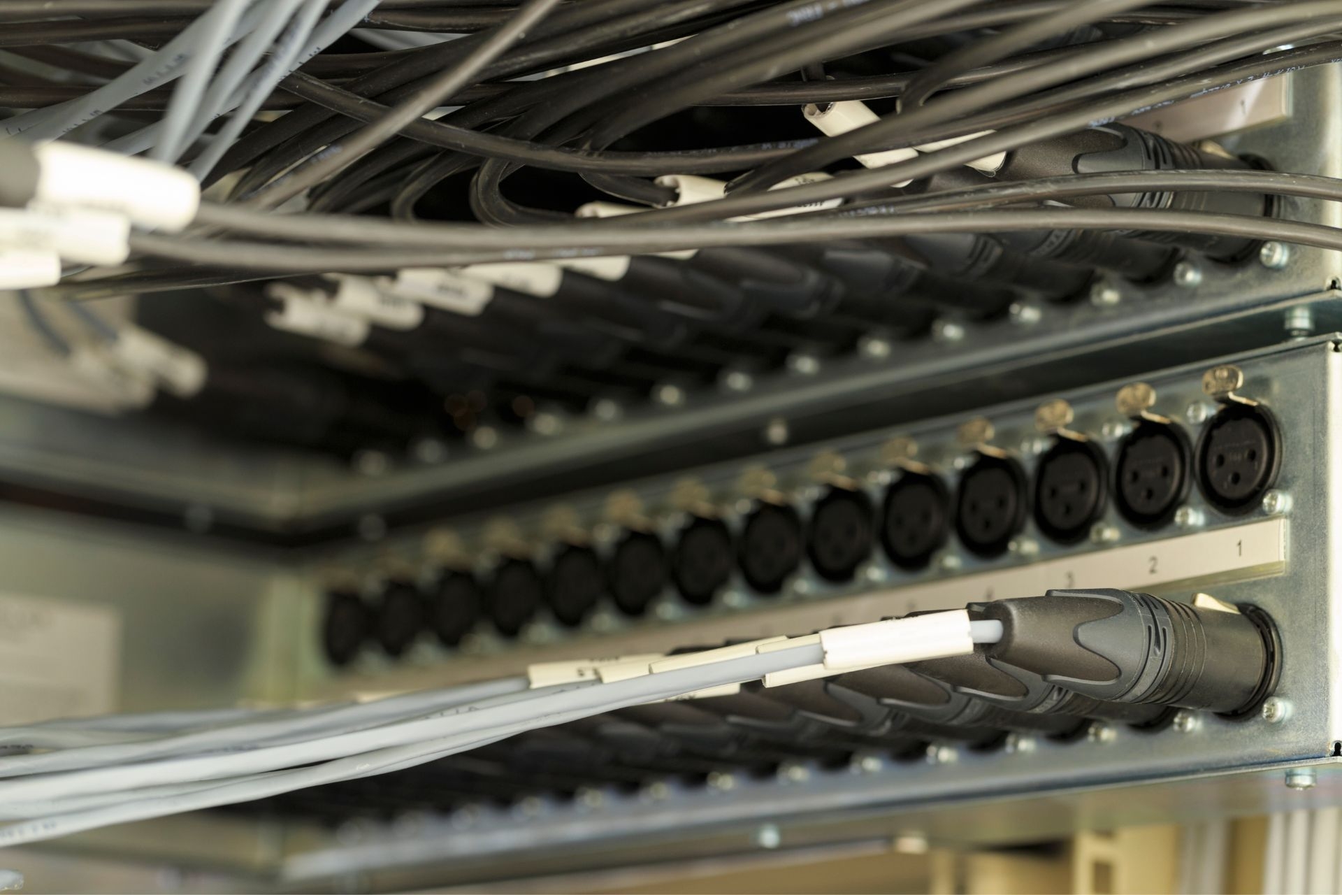 What are common sources of radio frequency interference in audio signals?