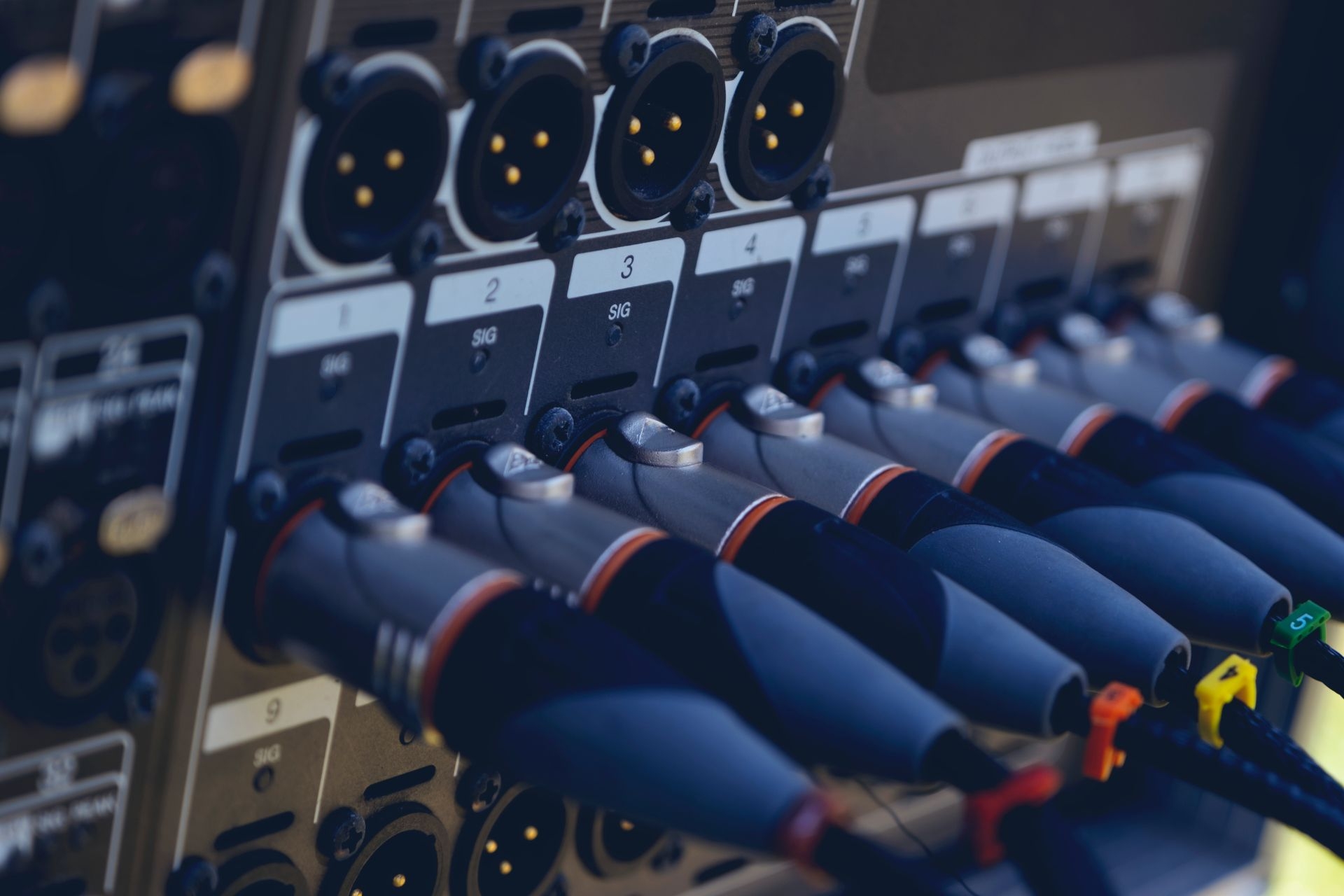 What are the common materials used in the construction of a balanced audio cable?