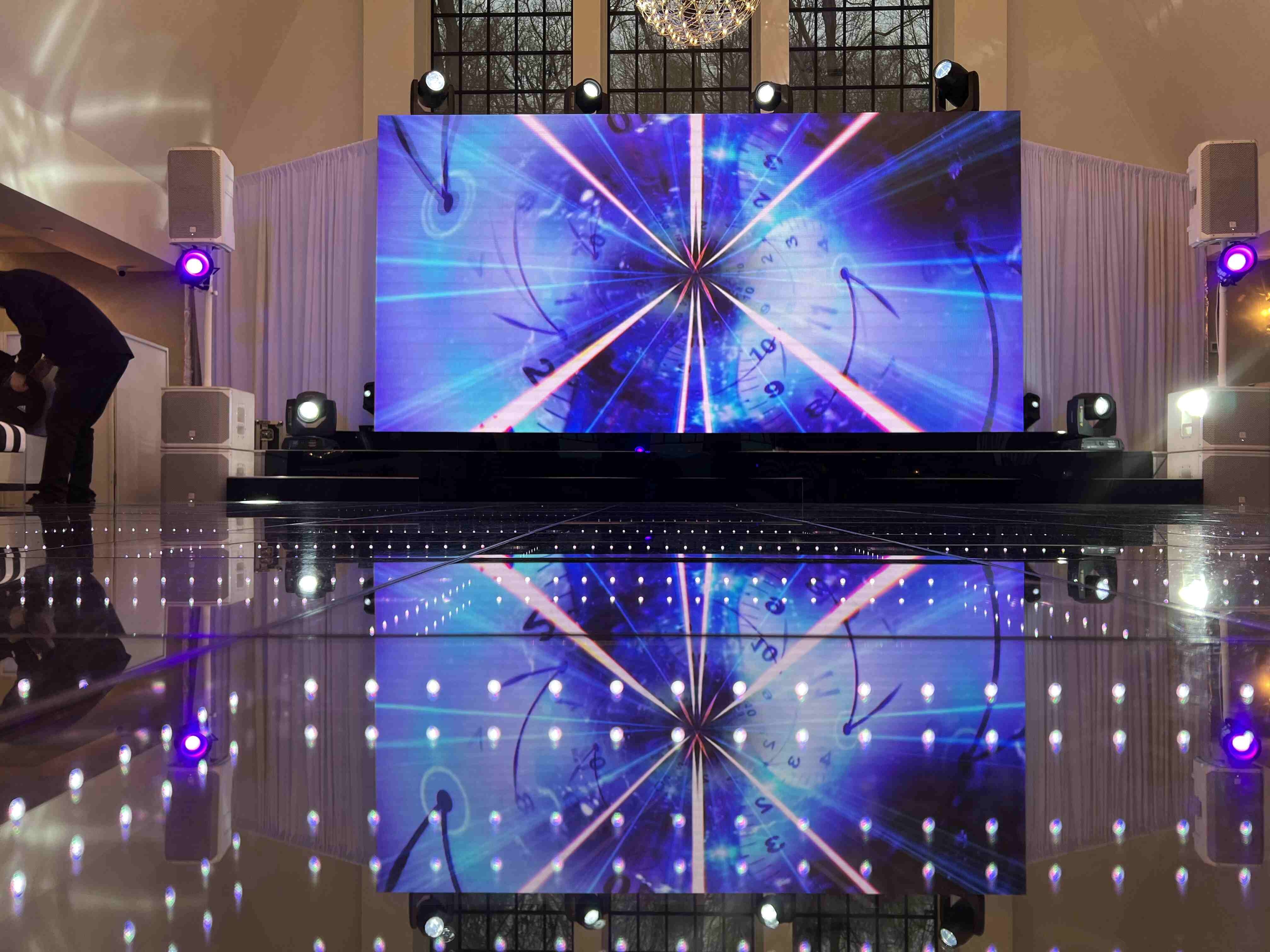 What are the key steps involved in calibrating LED walls for optimal brightness levels?