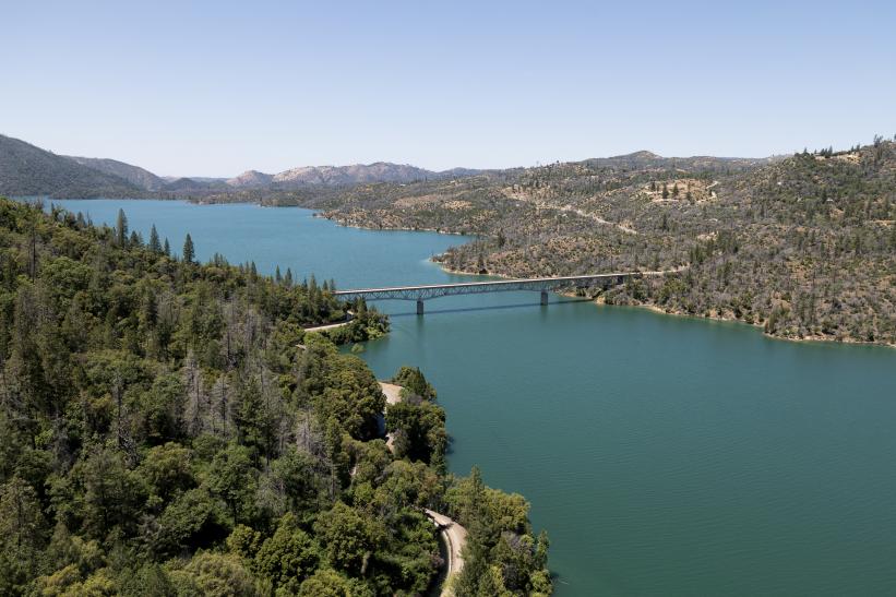 An aerial view in May 2025 shows high water conditions at Enterprise Bridge located at Lake Oroville in Butte County, California. Lake Oroville is the State Water Project’s largest reservoir. Photo courtesy of Nick Shockey / California Department of Water Resources. 