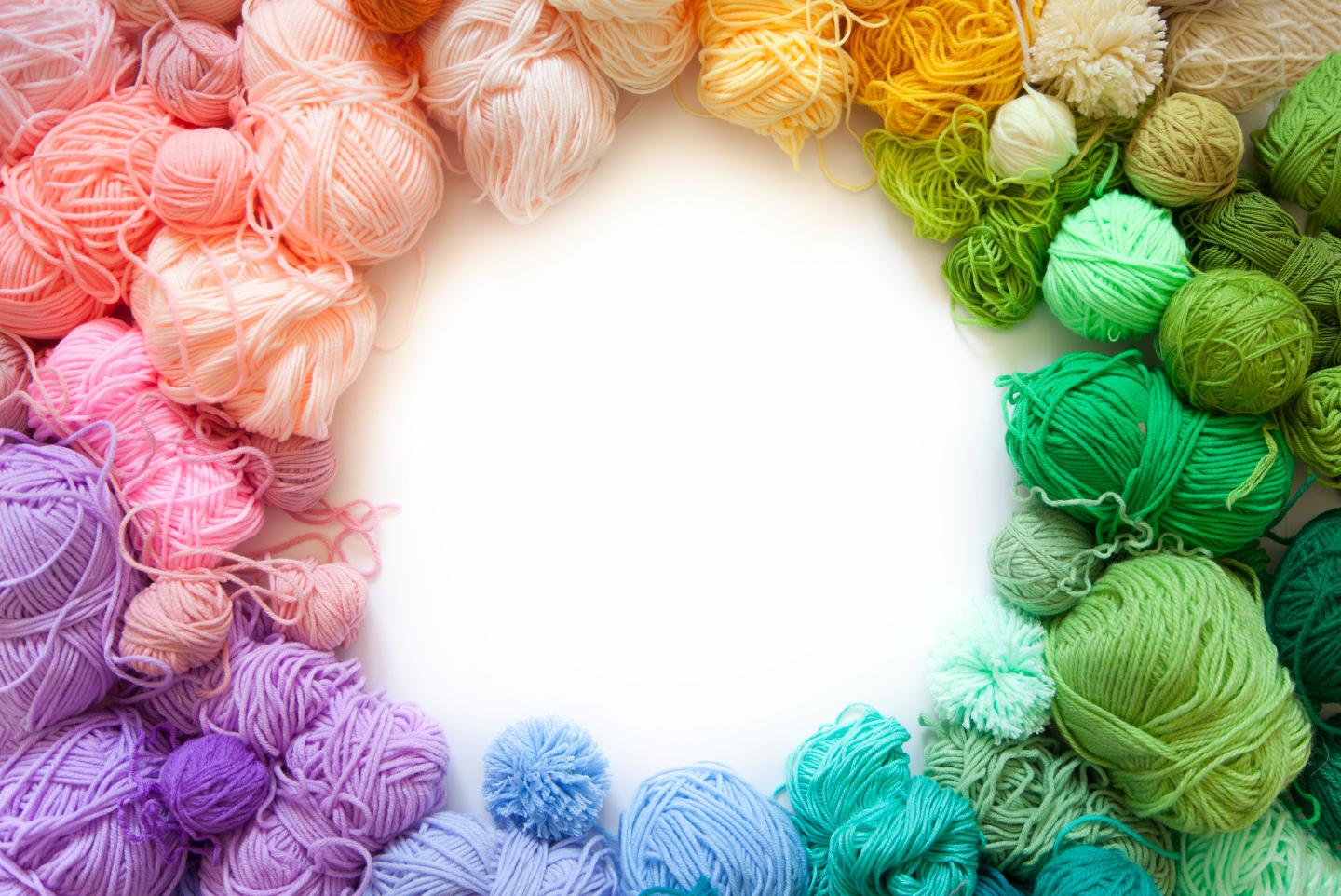 Picture of multicolored skeins of yarn arranged in a circle.