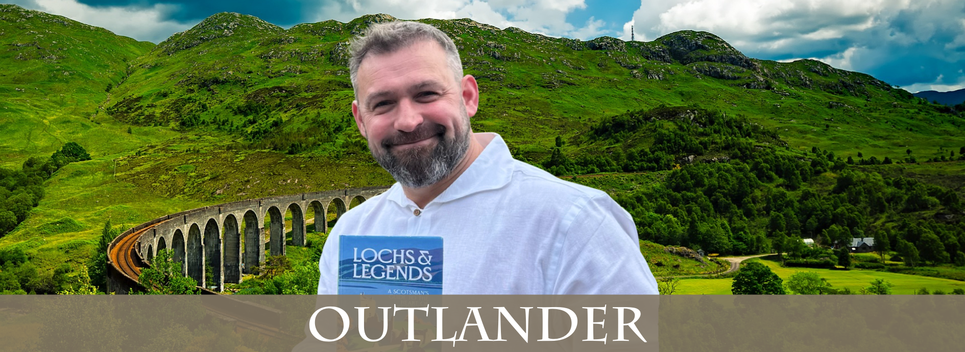 Andy the Highlander holding his book "Lochs and Legends"