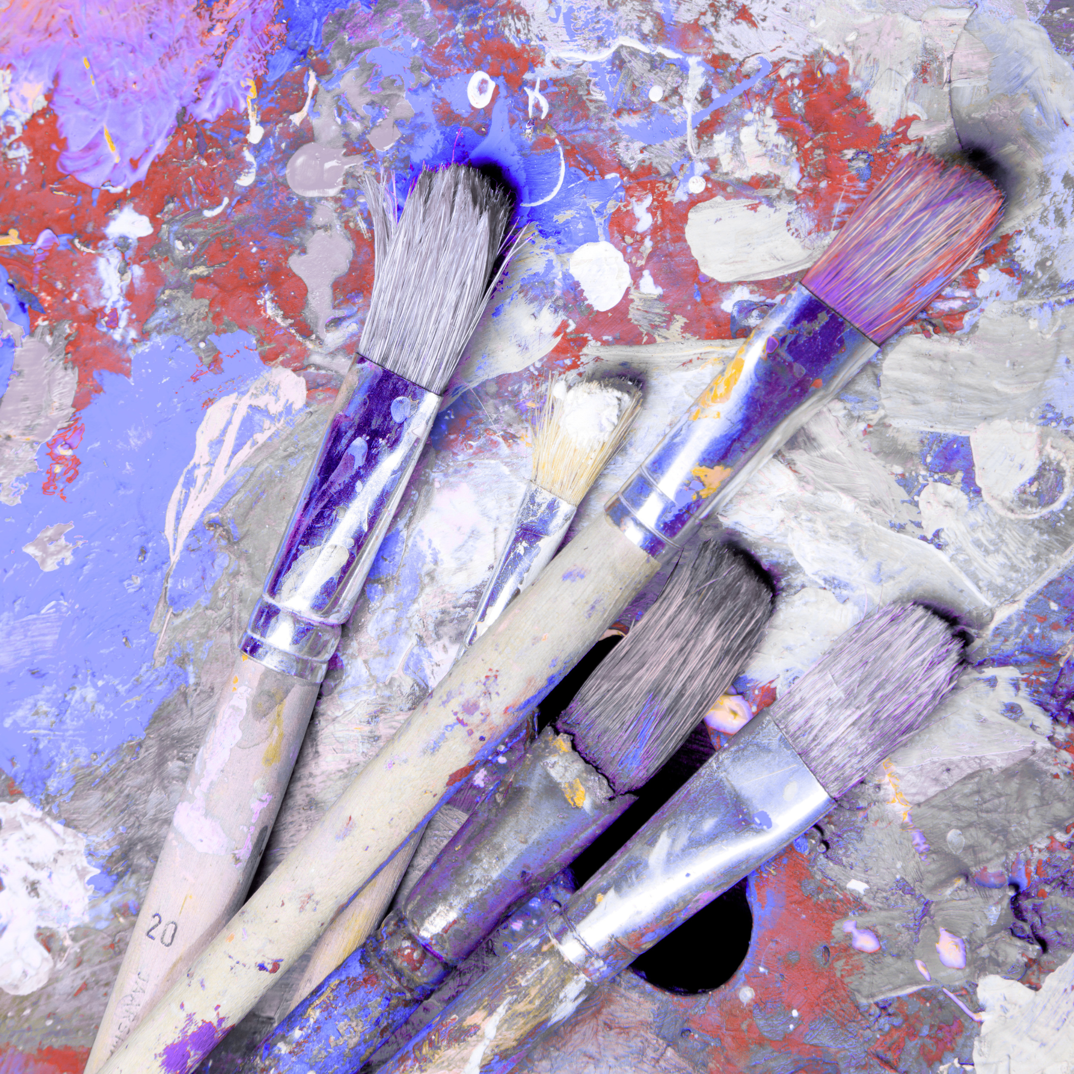 purple tinted paint brushes