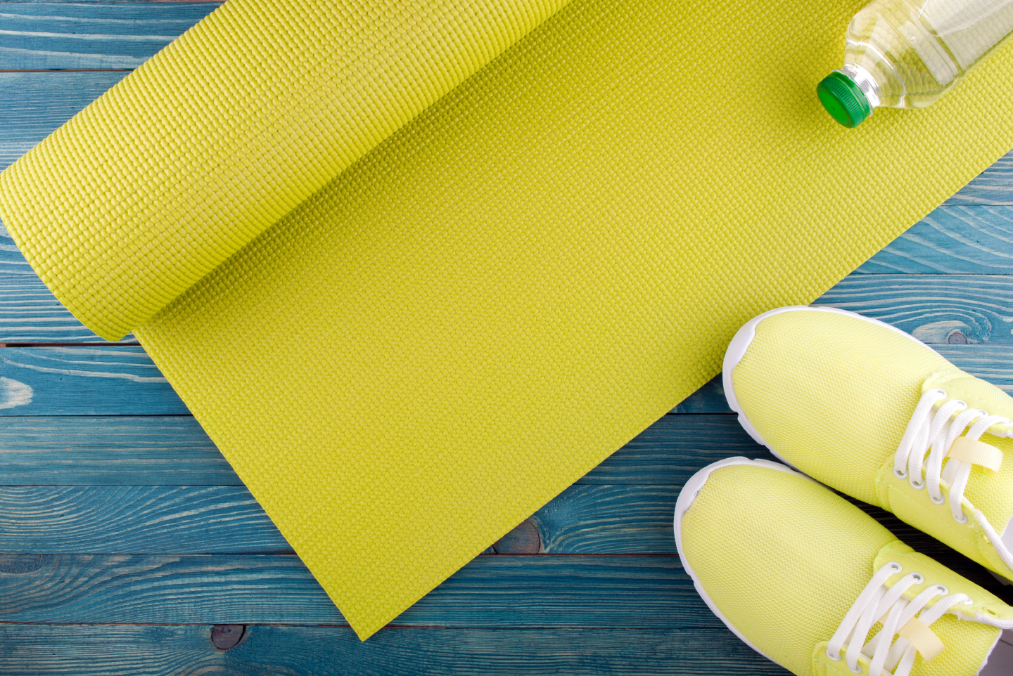 Yoga mat and pair of shoes