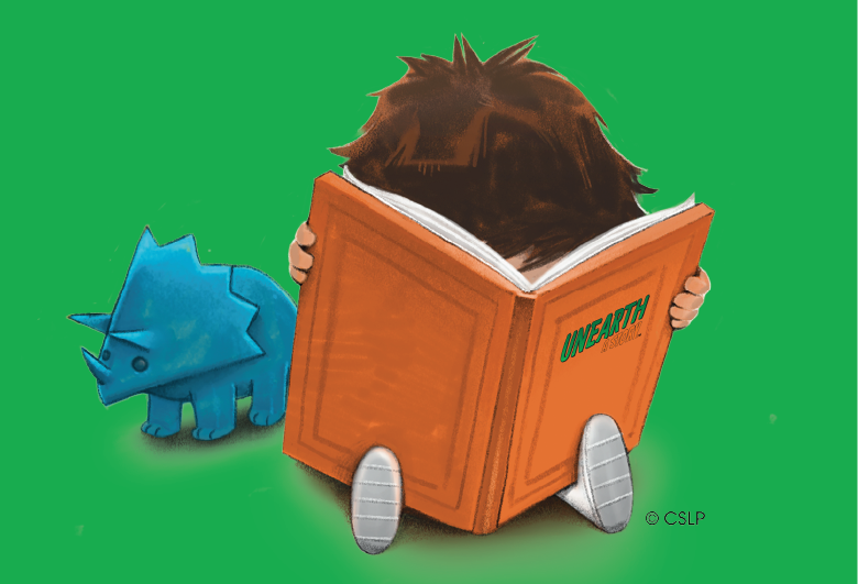 Child reading a large book next to blue dinosaur
