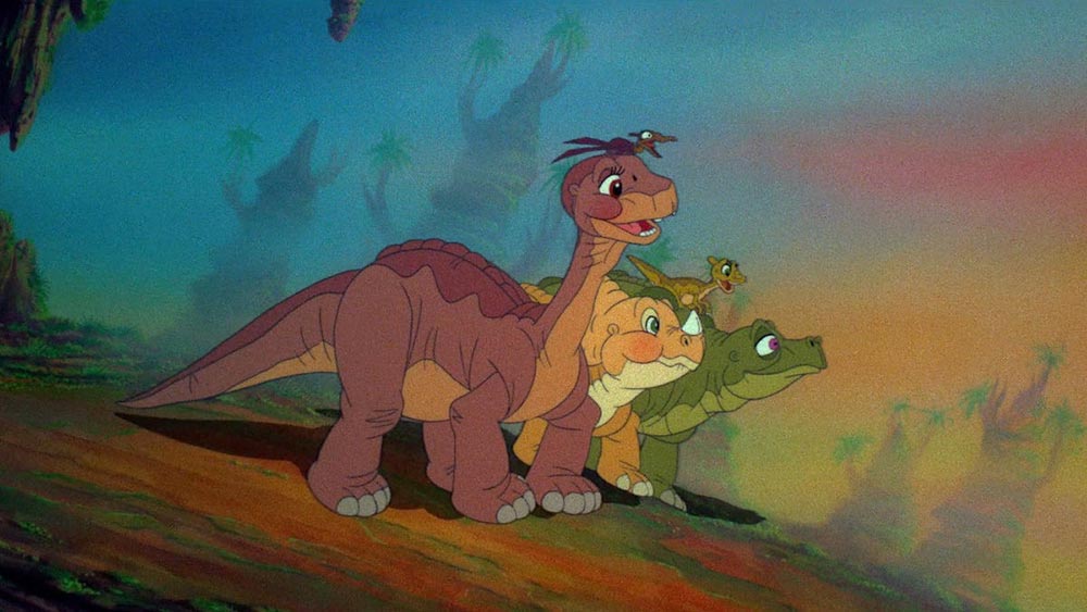 Baby dinosaurs smiling and looking over the horizon