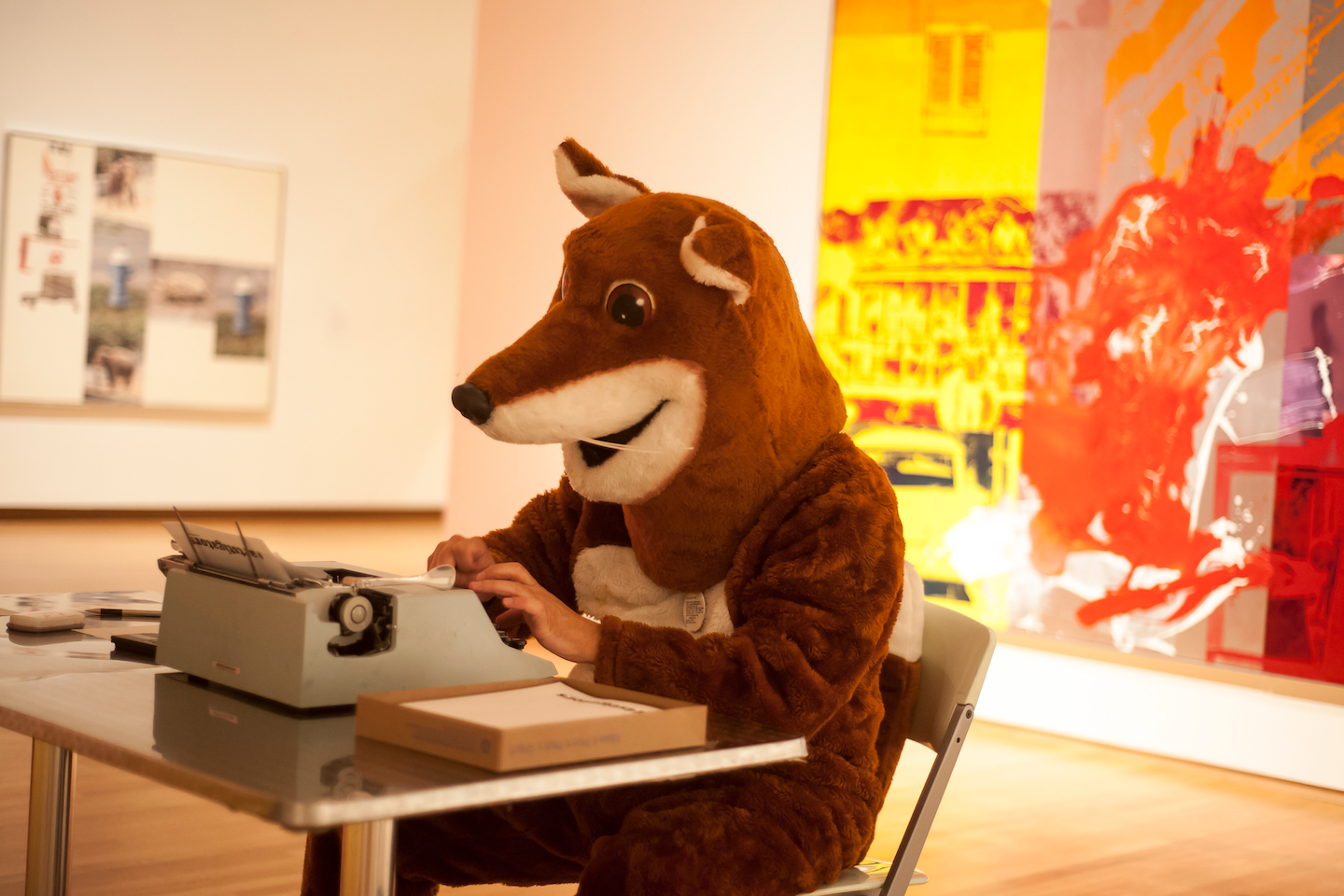 The poetry fox seated at his typewriter