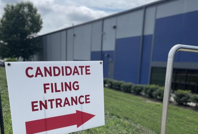 Candidate Filing Entrance sign pointing to Board of Elections building