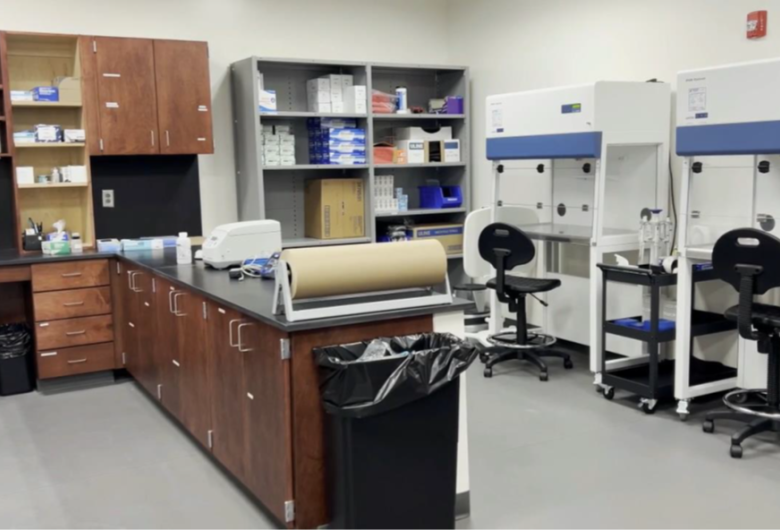 Wake County Bureau of Forensic Services DNA laboratory with workstations, biological safety cabinets and laboratory equipment for forensic evidence analysis.