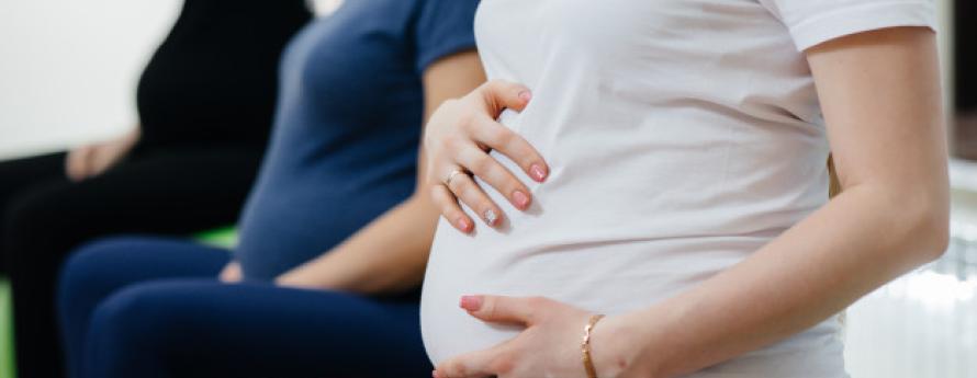 3 pregnant mother sitting down