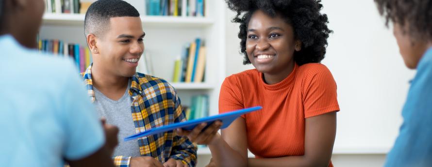 Two youths smiling 