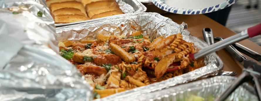 trays of food at a group meal