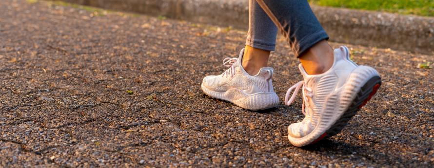 women walking on pavement 