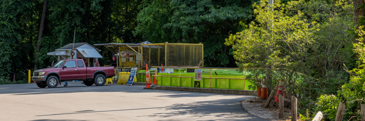 convenience center with pickup truck parked inside