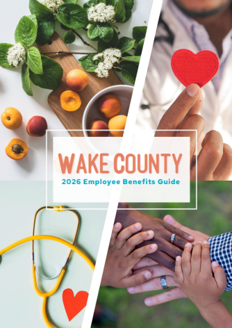 Cover of Wake County 2026 Employee Benefits Guide showing healthy food, a heart, a stethoscope, and diverse hands symbolizing wellness and teamwork
