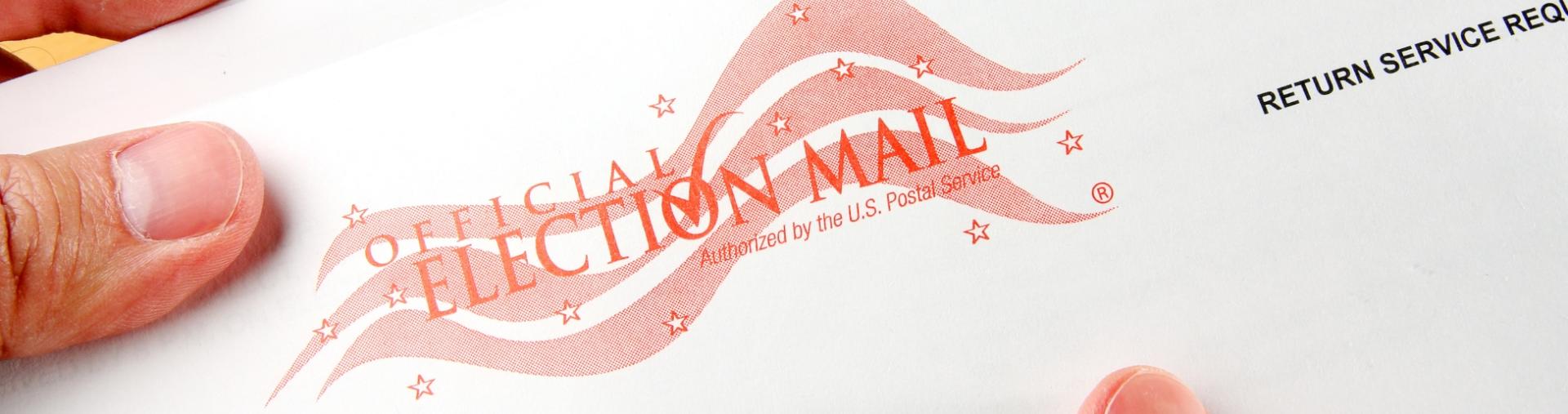 Close-up of an official election mail envelope