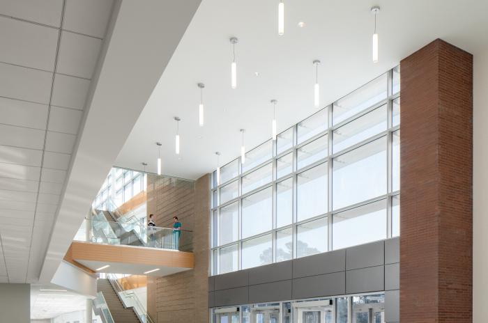 Wake County Public Health Building Lobby Entrance through glass doors and escalator.