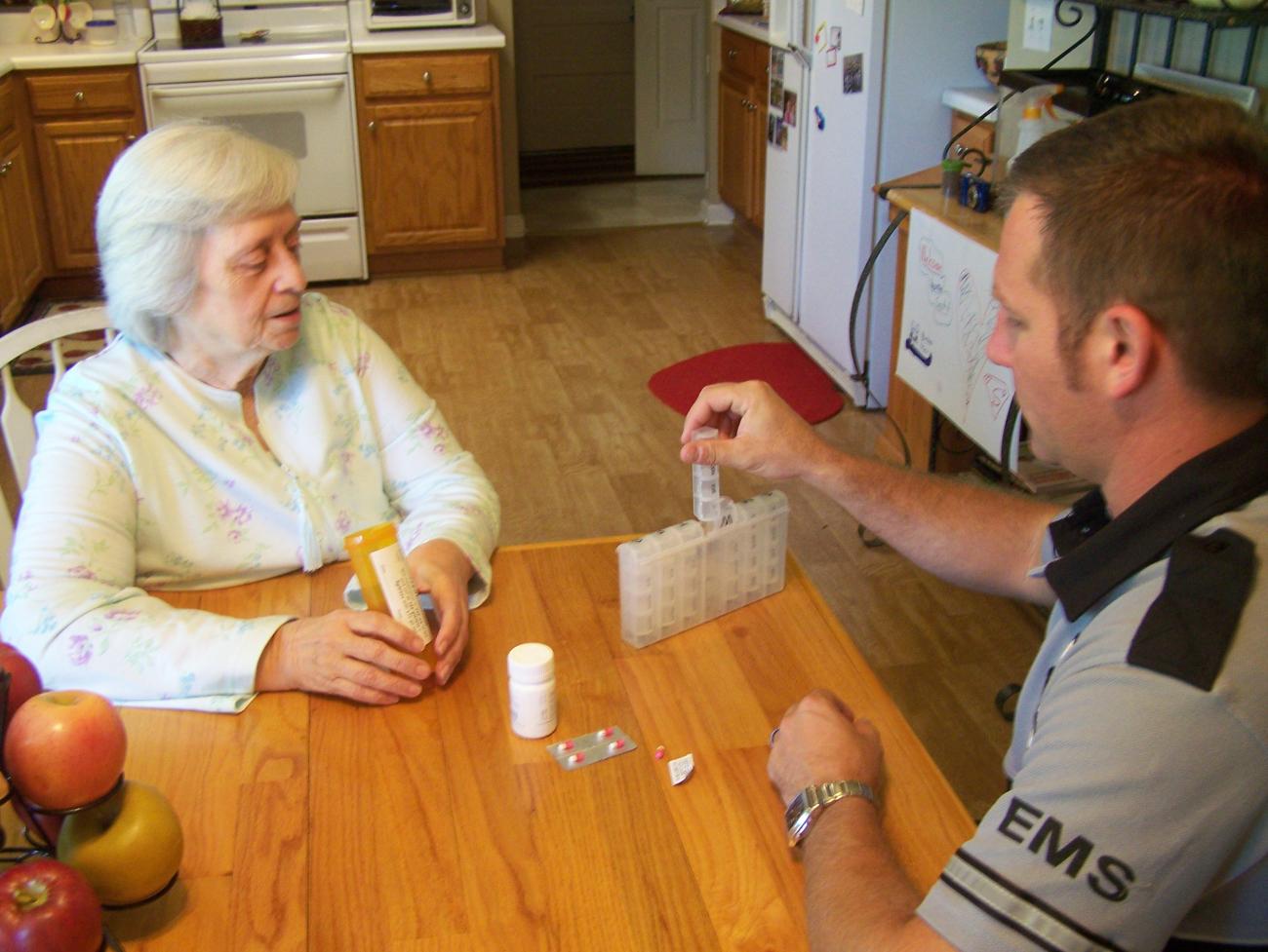 Community member receiving information from a paramedic