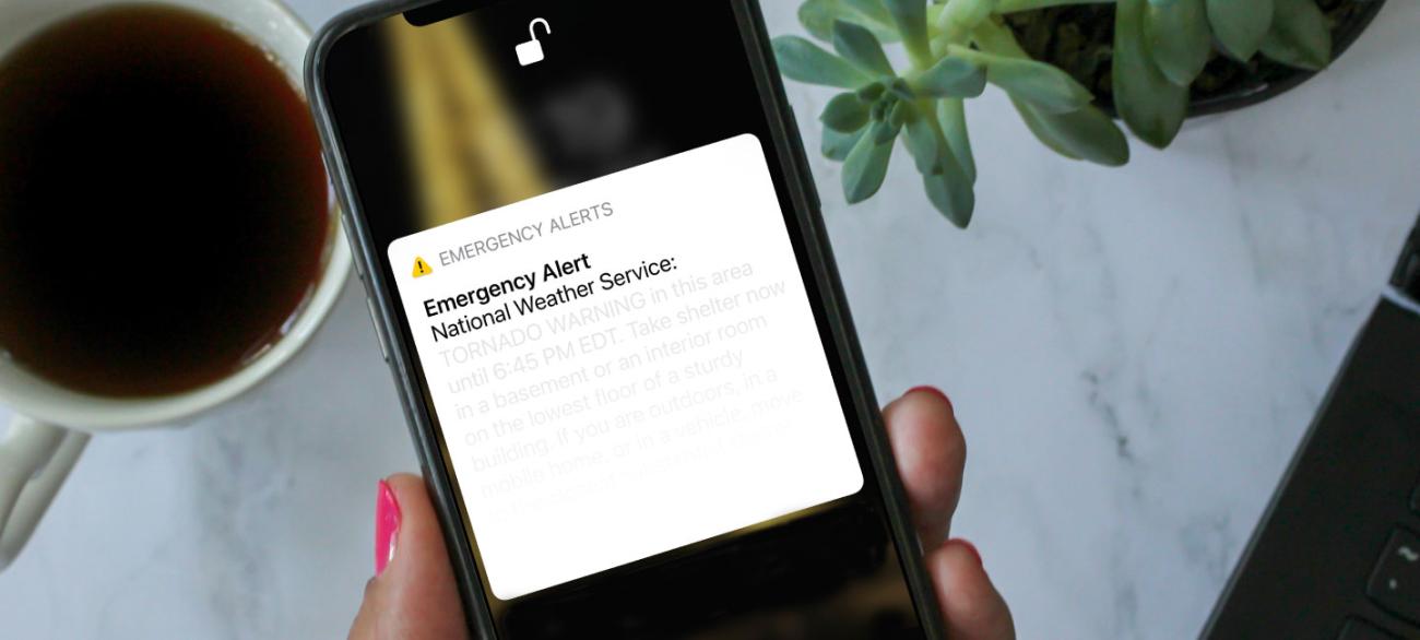phone showing sample emergency alert message