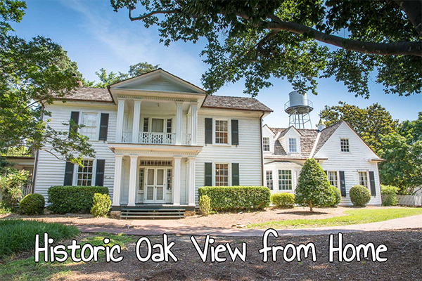 Front view of the main farmhouse with Historic Oak View From Home written on the photo