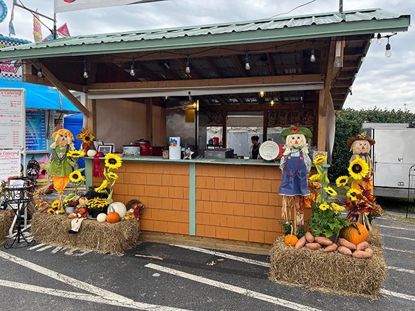 food stand with fall decorations