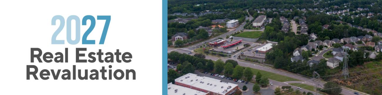 "2027 Real Estate Revaluation" with aerial view of neighborhood