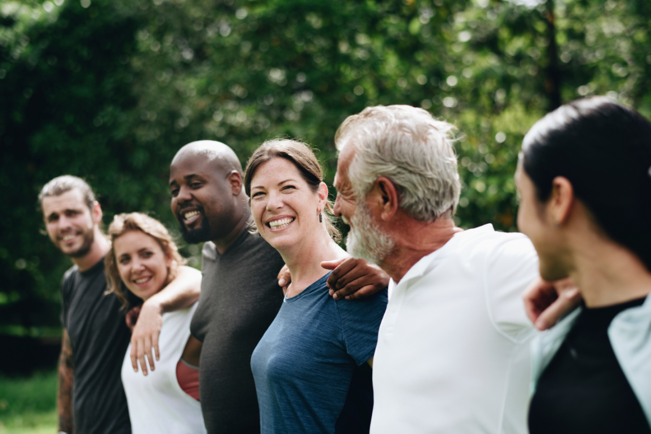 Group of people smiling outdoors