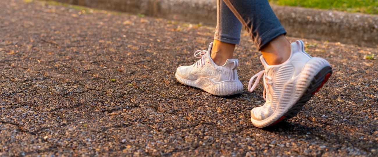 women walking on pavement 