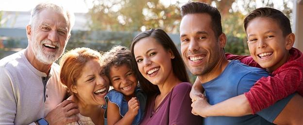 Diverse family pose for a family photo