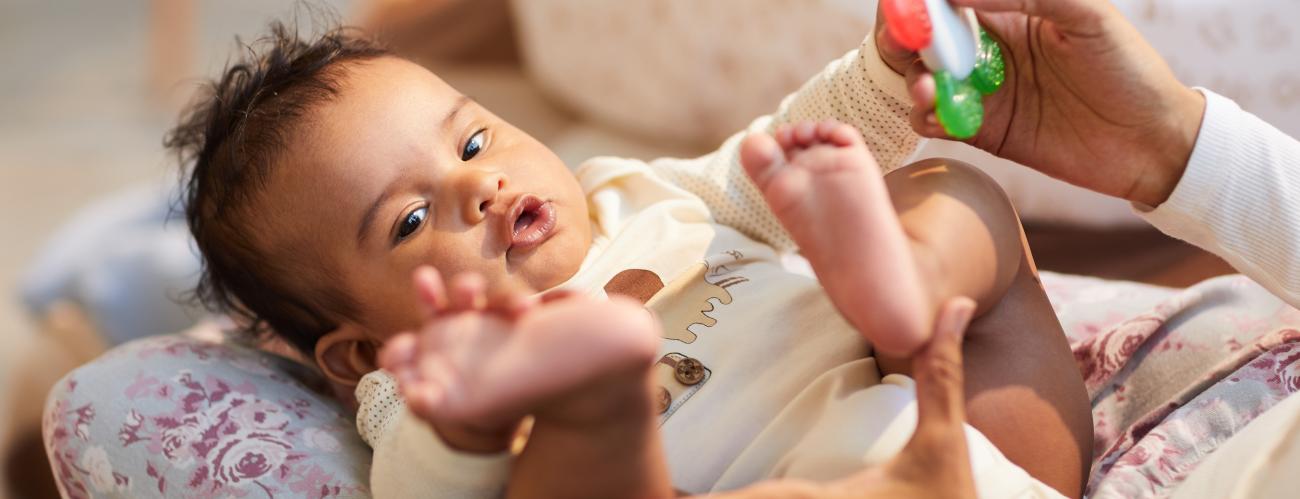baby on mothers lap 