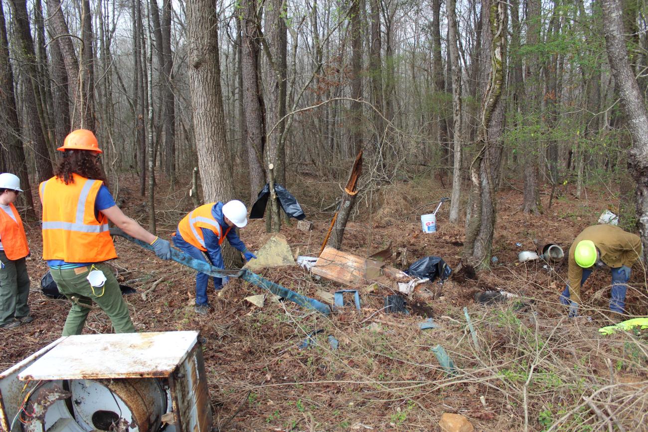 Dump site clean up work
