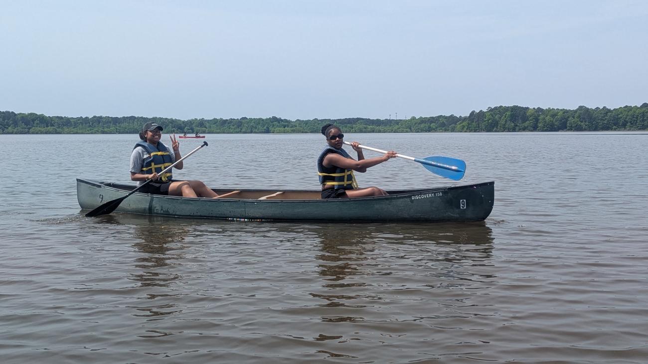 two women in a canoe