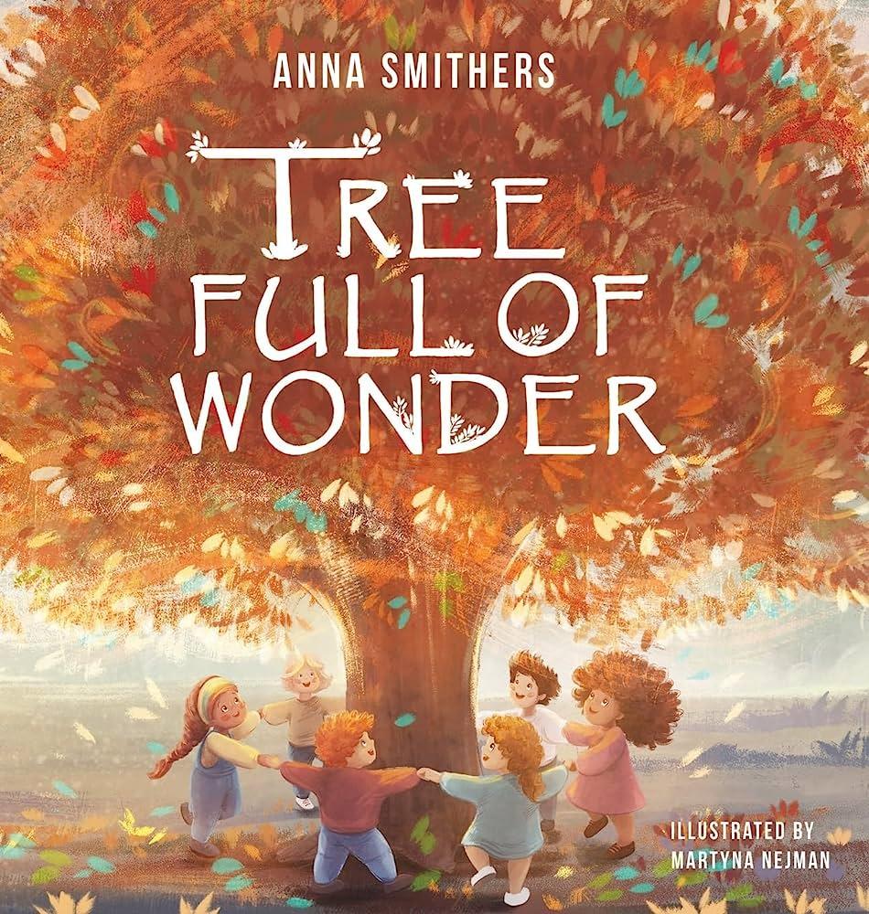Children holding hands and dancing around a large, colorful autumn tree with the title 'Tree Full of Wonder' above them.