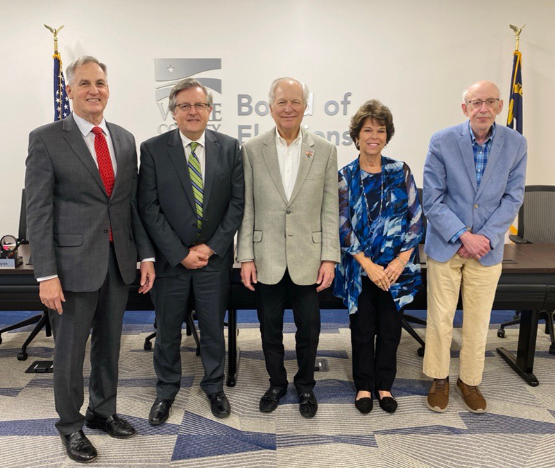 Image of the five members of the Wake County Board of Elections