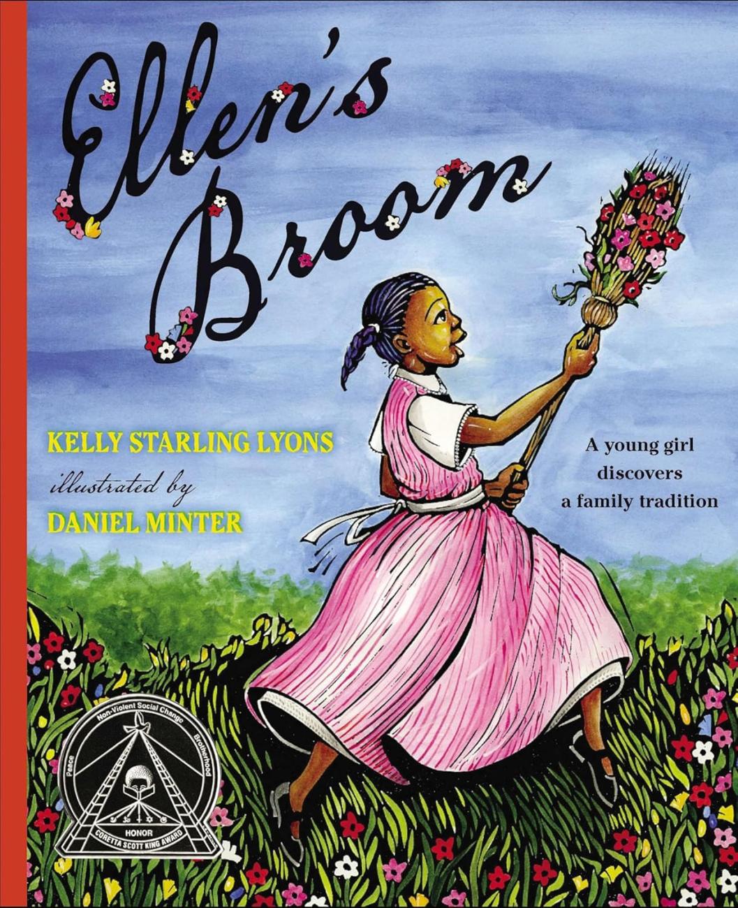 A young girl in a pink dress holds a decorated broom, standing in a flower-filled field under a blue sky.