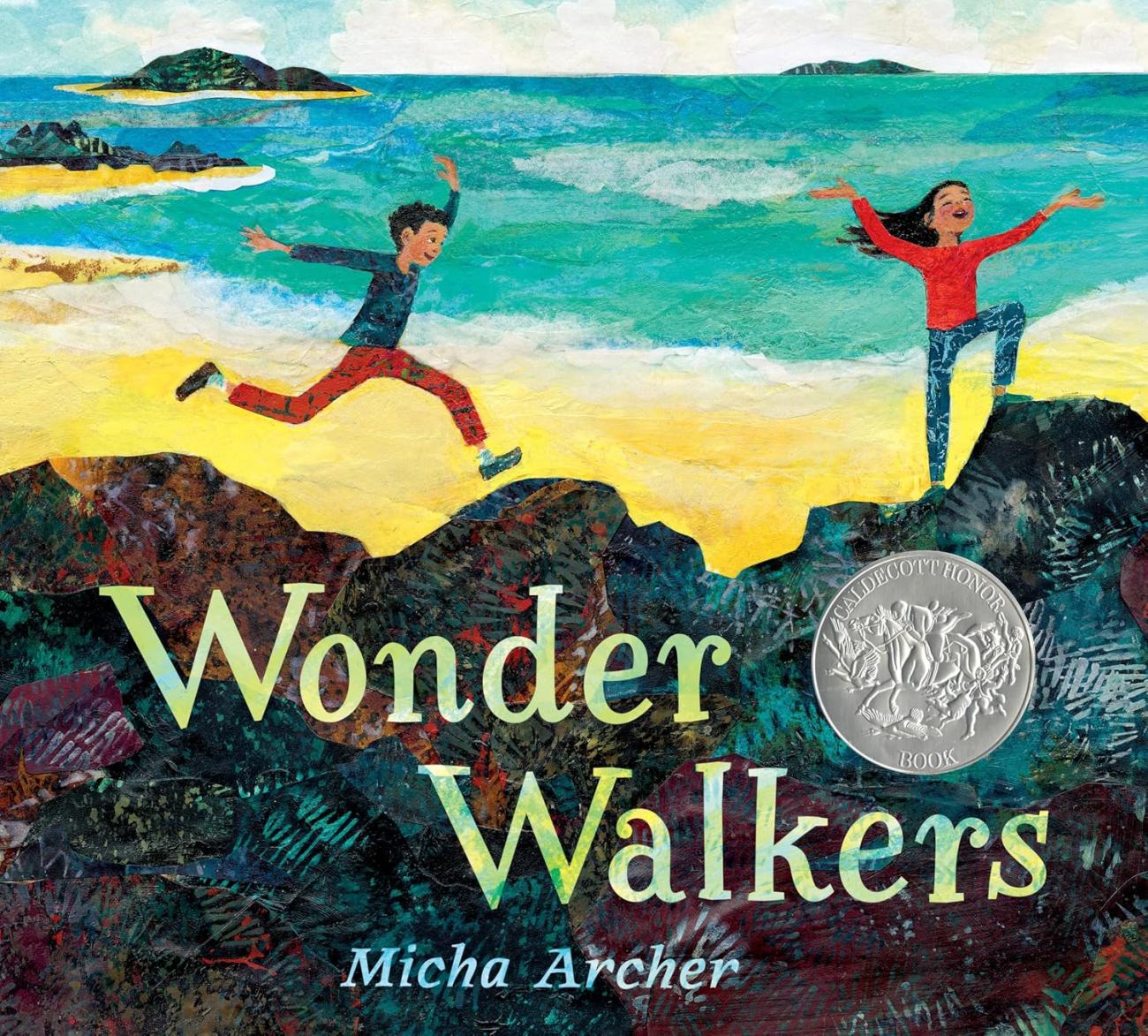 Two children joyfully leap across rocky terrain by a vibrant ocean shore under a bright sky.