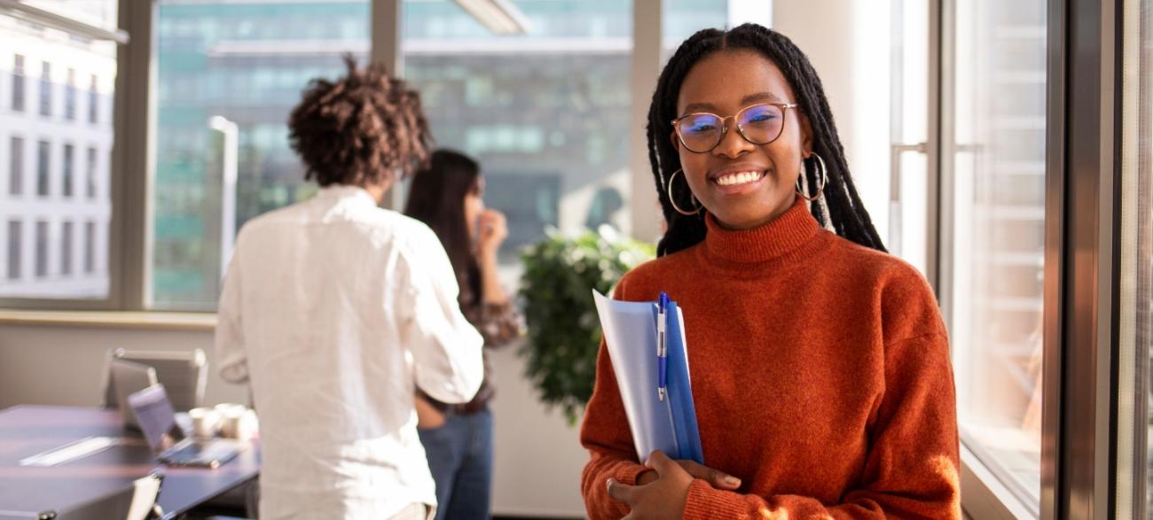 An intern smiling at the camera