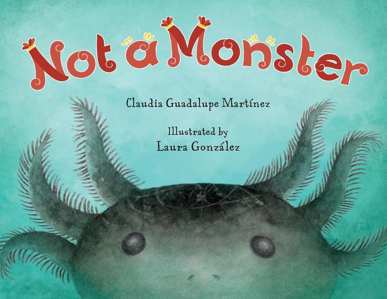 Cover of 'Not a Monster' featuring a friendly, dark green creature with multiple feathery antennae against a teal background.