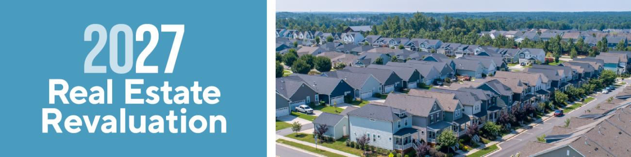 2027 Real Estate Revaluation banner with aerial photo of a neighborhood.