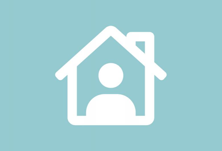 House icon with person in it