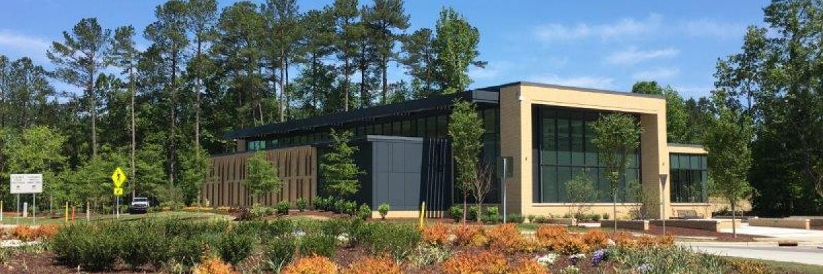 A picture of Morrisville Community Library from the Roundabout