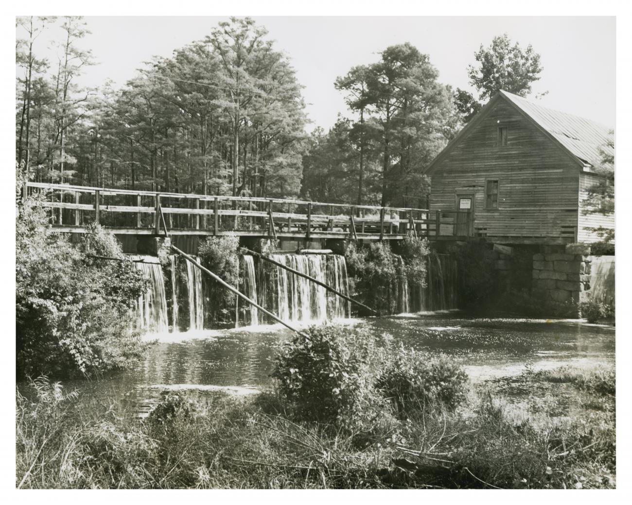 Historical photo of the mill and dam