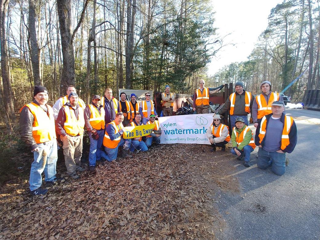 Group of volunteers that participated in "The Big Sweep" trash pick up event